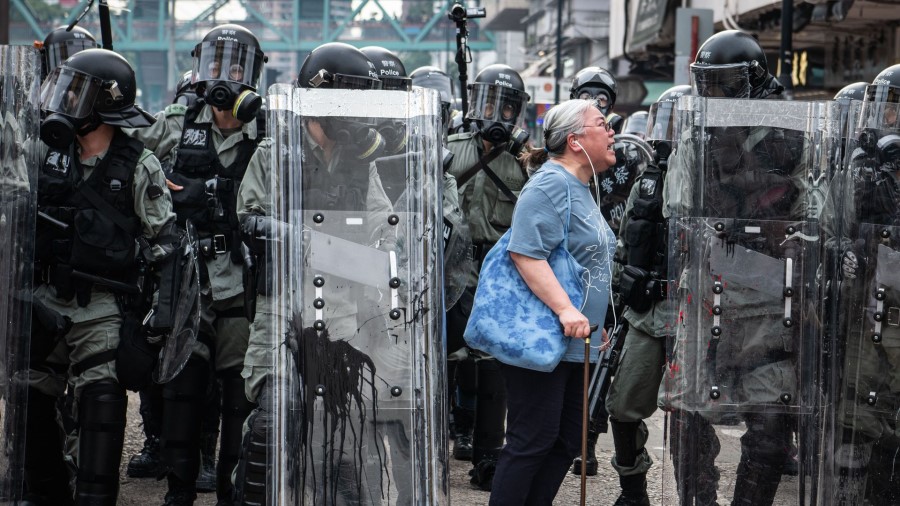 Why is the Protest Escalating in Hong Kong and China Preparing for a Raid?